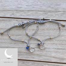 Load image into Gallery viewer, Pulseras en hilo trenzado con piedras laminadas en oro