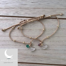 Load image into Gallery viewer, Pulseras en hilo trenzado con piedras laminadas en oro