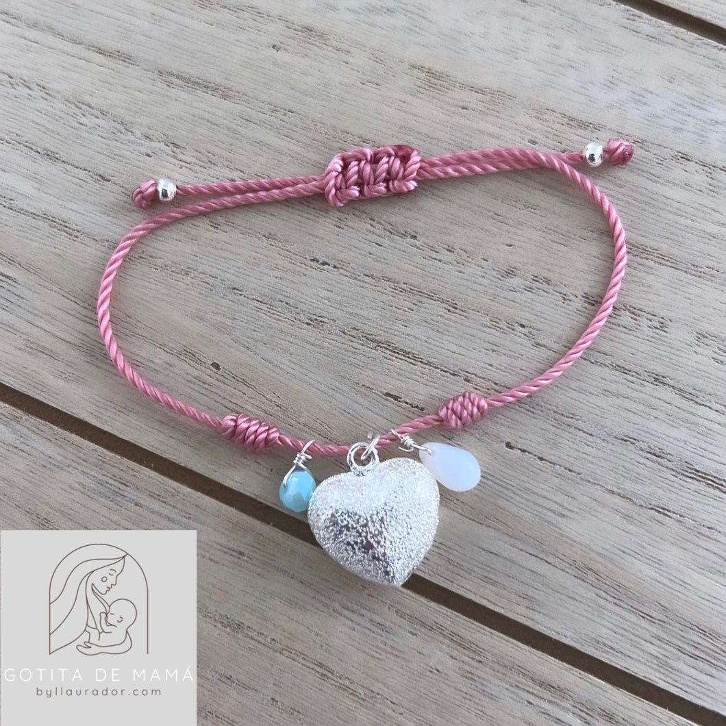 Pulsera en hilo trenzado con corazón plateado